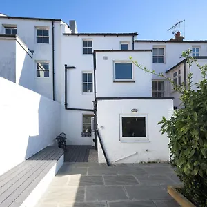 Vibrant Spring Street With Garden , Brighton United Kingdom